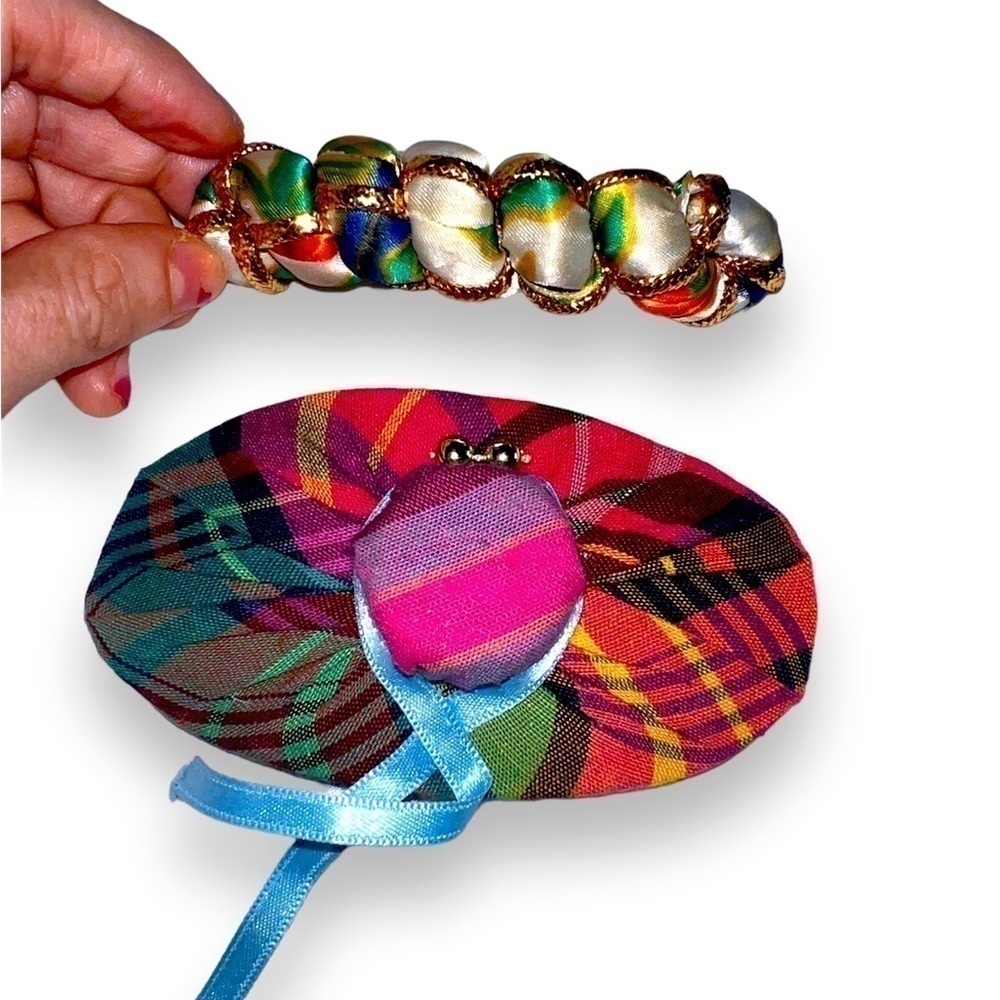 TWO sweet fabric barrettes: one like a hat with ribbon, one satin.